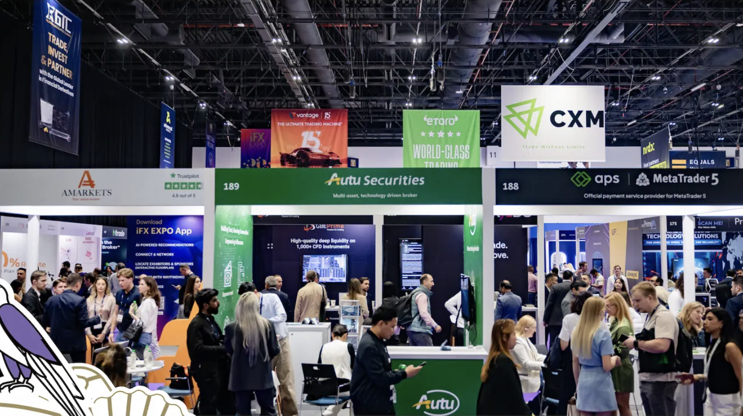 Attendees at the iFX EXPO Dubai 2026 exhibition floor with branded booths and the iFX EXPO App on display